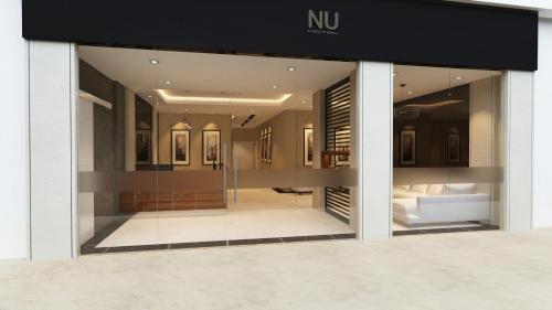 a store front with a window with a view of a store at NU Hotel @ KL Sentral in Kuala Lumpur