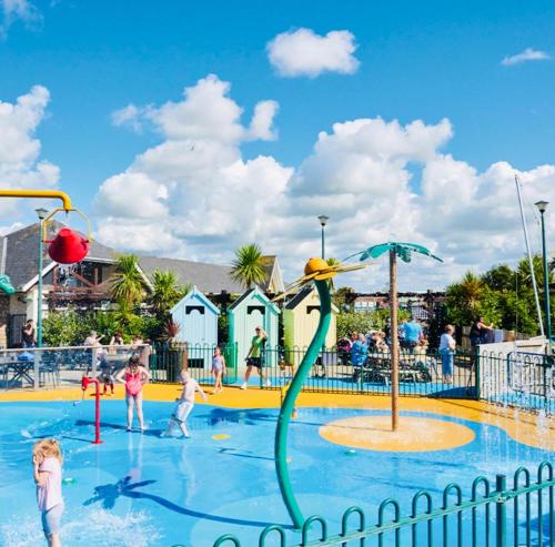 a group of children playing in a water park at Caravan-Blackpool-FamilyFriendly-Activities in Fleetwood
