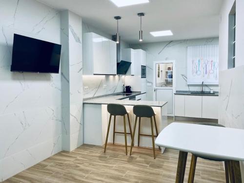 Acogedora casa familiar de 4 habitaciones y gran terraza a metros de la playa