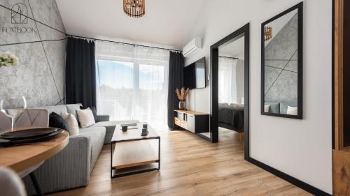 Posezení v ubytování Flatbook Apartamenty - Jantar Resort