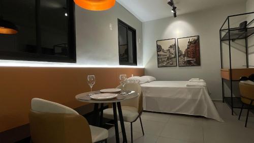 Studio completo com piscina em São Carlosにあるベッド