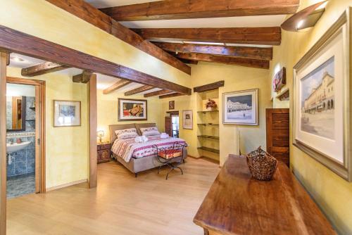 Postel nebo postele na pokoji v ubytování Joile Maison - In the heart of Aosta