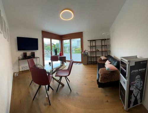 TV a/nebo společenská místnost v ubytování Komfortable Ferienwohnung in Beckenried, Nidwalden