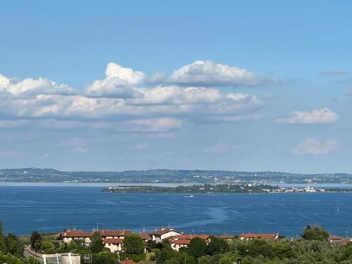 a view of a large body of water at La Gialla Attico dAmore in Padenghe sul Garda