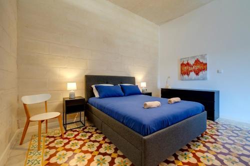 Letto o letti in una camera di Exclusive 2BR Valletta Apartment