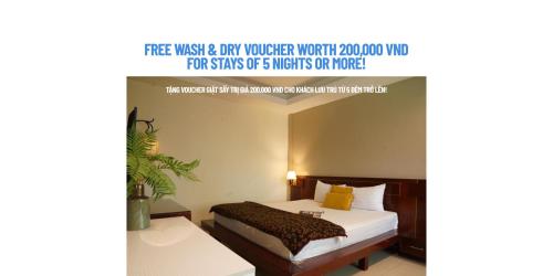 a hotel room with a bed and a desk at Trang An Hotel - 10 minutes Landmark 81 in Ho Chi Minh City