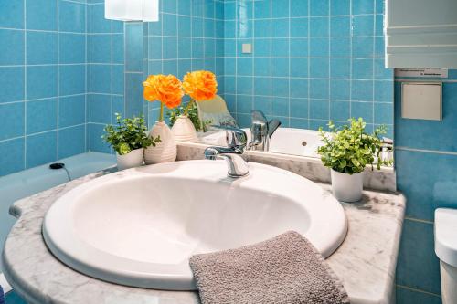 Ένα μπάνιο στο Ferienwohnung Adrion