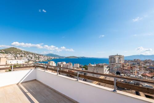 a view of the city from the roof of a building at Lazy Roo Hostel Saranda in Sarandë