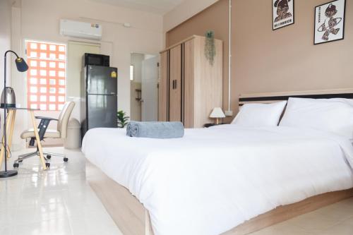 Katil atau katil-katil dalam bilik di Relax Inn DMK
