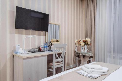 Voodi või voodid majutusasutuse HUMO hotel toas