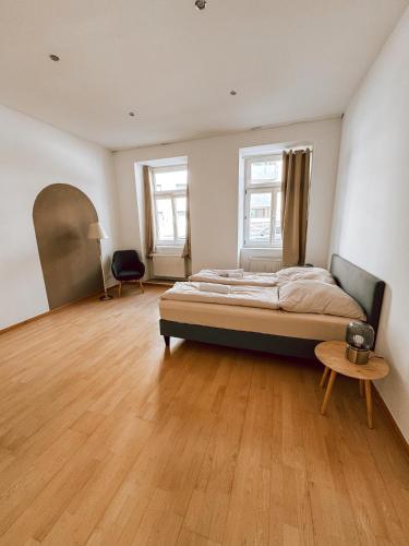 Posteľ alebo postele v izbe v ubytovaní Zentrales Apartment nähe Schönbrunn - 5 Pers