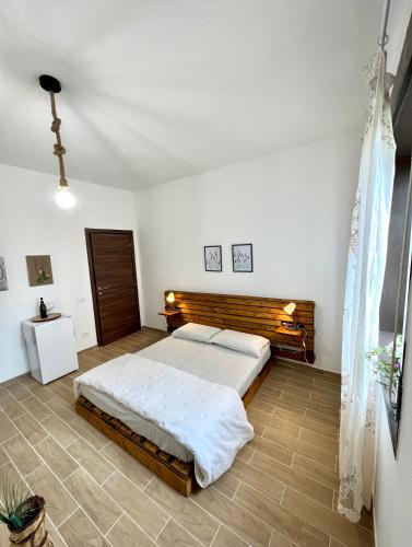 a bedroom with two beds in a room at Villa delle Stelle in Cassaro