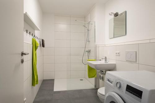 Ένα μπάνιο στο Ferienwohnung Badespaß