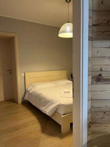 Giường trong phòng chung tại Casa Vacanze Ranuncolo 1