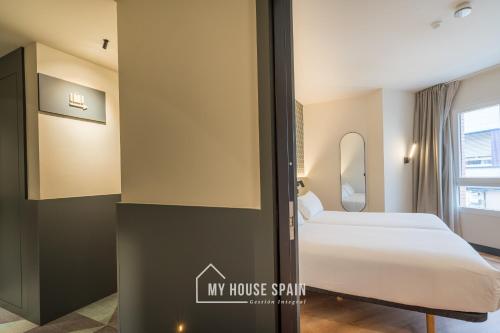 Katil atau katil-katil dalam bilik di Novarooms by MyHouseSpain