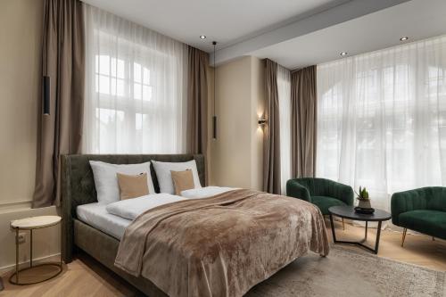 Postel nebo postele na pokoji v ubytování Boutique Hotel by Maier - contactless check-in