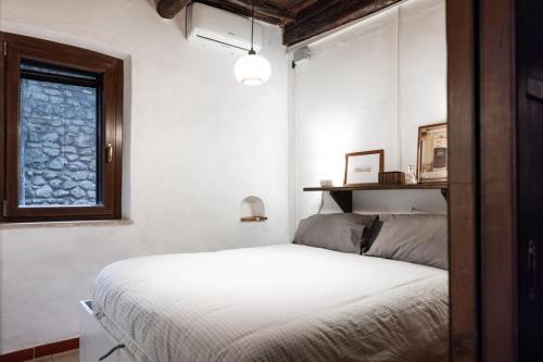Ένα ή περισσότερα κρεβάτια σε δωμάτιο στο Alle Scalette - Casa Vacanze