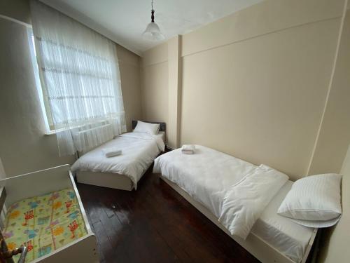 Ένα ή περισσότερα κρεβάτια σε δωμάτιο στο Lavera Home
