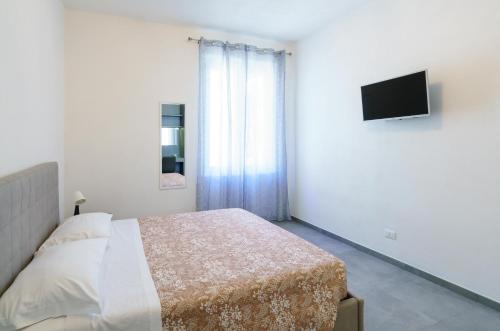 TV a/nebo společenská místnost v ubytování Home