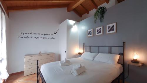 Katil atau katil-katil dalam bilik di Sole Luna Homes - Appartamenti in Corte