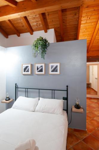Katil atau katil-katil dalam bilik di Sole Luna Homes - Appartamenti in Corte