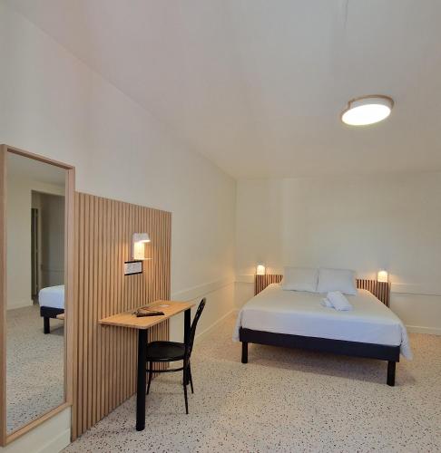 Postel nebo postele na pokoji v ubytování Hotel Eisenhower