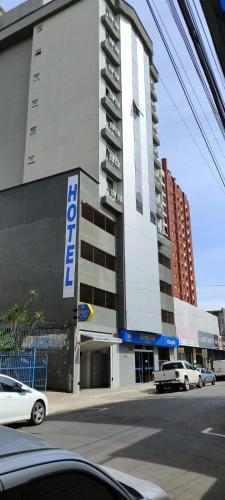 a building with a car parked in front of it at Klein Ville Marquês in São Leopoldo