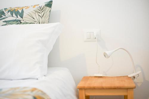 Ένα ή περισσότερα κρεβάτια σε δωμάτιο στο Baronetto B&B