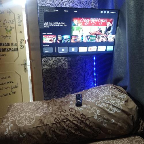 Ένα ή περισσότερα κρεβάτια σε δωμάτιο στο Asta room