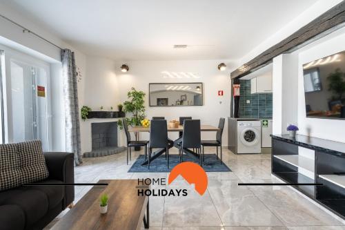 a living room with a couch and a table at #268 Luxury Villa Pool & Views in Albufeira
