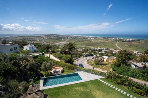 an aerial view of a villa with a swimming pool at Best 4 Bedroom Luxury Villa In Mediouna in Jbila