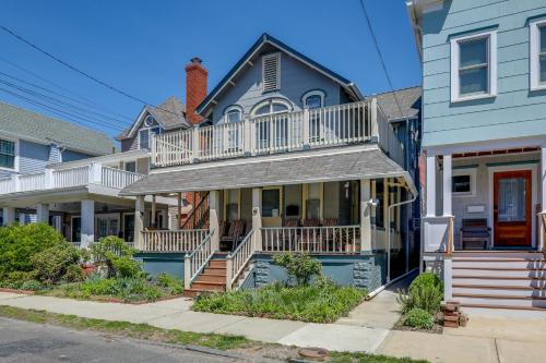 a house with a balcony on the front of it at Walk to Beach and Dtwn Apt in Ocean Grove in Ocean Grove
