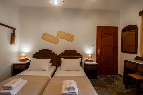Postel nebo postele na pokoji v ubytování Mirsini Apartments in Sifnos