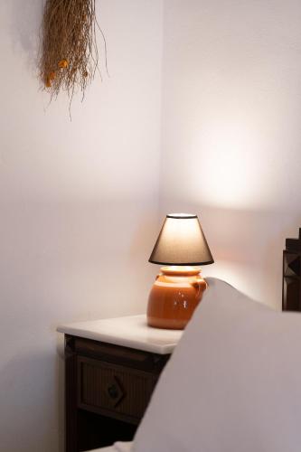 Postel nebo postele na pokoji v ubytování Mirsini Apartments in Sifnos