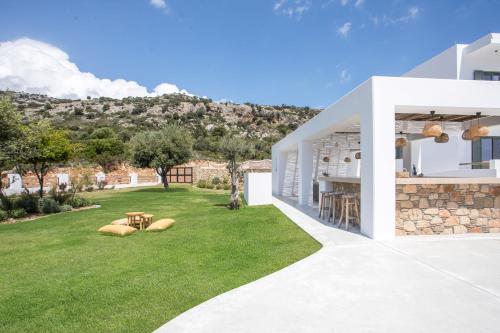 a view of the backyard of a house at Villa Elaia in Afantou