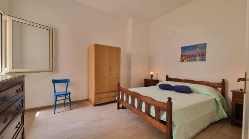 Postel nebo postele na pokoji v ubytování La Bonaccia by LoveSud