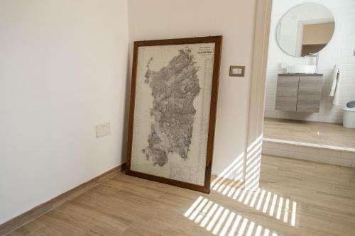 a picture of a map on a wall in a room at Domu Mena - Domusnovas in Domusnovas
