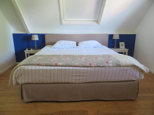 Ένα ή περισσότερα κρεβάτια σε δωμάτιο στο B&B 7de Hemel