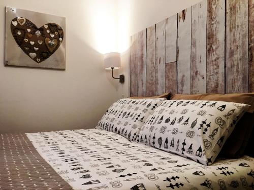 Postel nebo postele na pokoji v ubytování Dolomiti