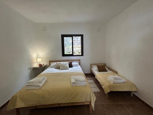 Ένα ή περισσότερα κρεβάτια σε δωμάτιο στο Casa Julián