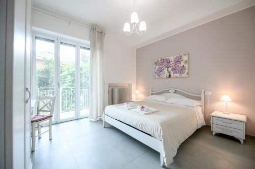 Posteľ alebo postele v izbe v ubytovaní B&B La Fontanella