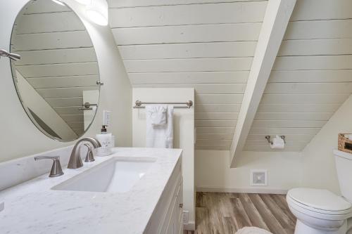 a bathroom with a sink and a mirror at Family Cabin in Blue Lake Springs, Near Town! in Arnold
