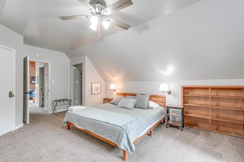 a bedroom with a bed and a ceiling fan at Family Cabin in Blue Lake Springs, Near Town! in Arnold