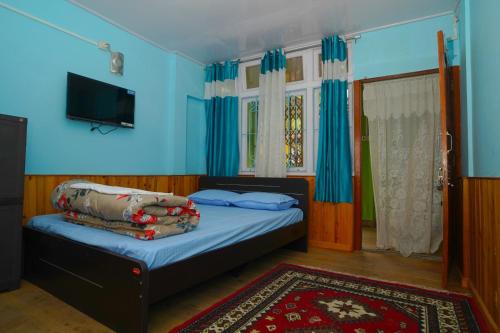 Postel nebo postele na pokoji v ubytování Dreamcatcher Lodge