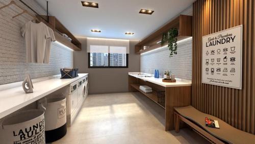a laundry room with a sink and a counter at 81NV Studio Liberdade SP 300 Metros Estação Japão até 03 pessoas in São Paulo