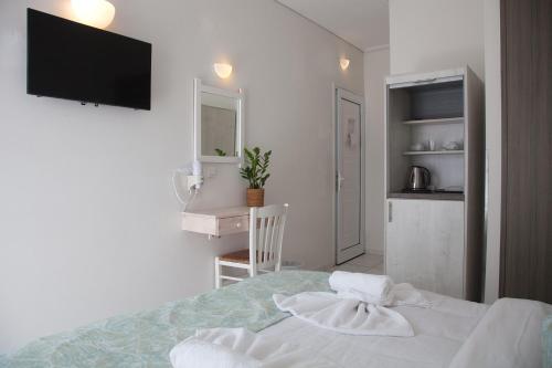Una cama o camas en una habitación de The Milos