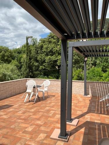 two chairs and a table on a patio at GioCla in Cassino