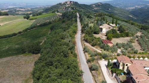 an aerial view of a house and a road at La Bella Vista in Collazzone