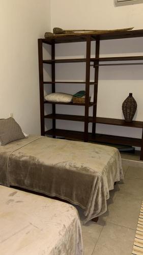 two bunk beds sitting in a room with at Beachfront house Private beach Pool 6 people in El Zapote