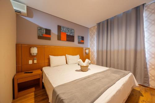Postel nebo postele na pokoji v ubytování Hospedez - Flats New Osasco Trade Center